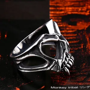 Vintage stainless steel skull mask ring for men featuring detailed punk gothic styling