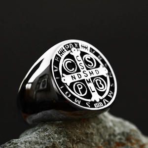 Macro shot of Saint Benedict Medal ring featuring vintage stainless steel craftsmanship