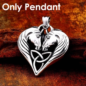Macro view of Viking Celtic knot double horse head pendant on dark wood base