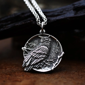 Vintage stainless steel round owl relief pendant with detailed forest branch texture