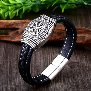Close-up of Viking leather bracelet featuring Aegishjalmur symbol and runic metal plate