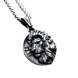 Vintage stainless steel round lion head pendant necklace with an industrial gothic finish