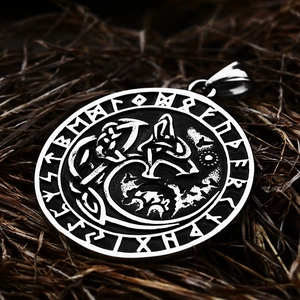 Detailed close-up of a vintage stainless steel Viking wolf totem pendant with Runic letters