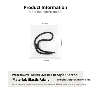 Detail view of black elastic hair tie with dimensions 10cm x 12cm and 9g weight