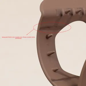 Detail view of large brown matte hair claw clip showing internal comb structure and paint finish