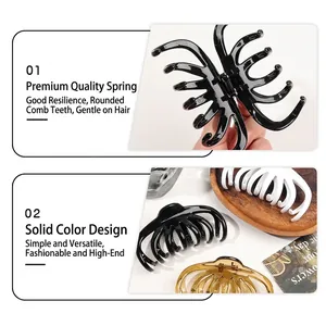 Large cream texture pumpkin hair claw clip in black, white and amber resin with metal spring