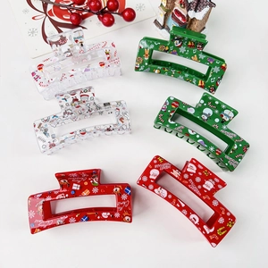 Détail de lot de 6 pinces à cheveux de Noël avec motifs festifs de Père Noël et bonhomme de neige