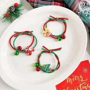 Detail von Weihnachts-Haargummis mit Weihnachtsmann, Lebkuchenmann und Glöckchen