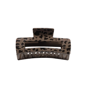 Elegant leopard print hair claw clip in coffee brown with rectangular hollow design