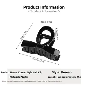 Detailed view of large black bow hair claw clip with measurements 8.5cm x 4.5cm