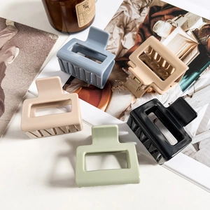 Five-piece set of matte rectangular hair claws in assorted soft colors for elegant hair styling