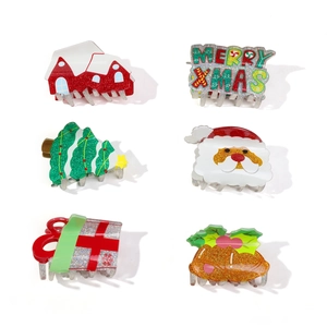 6-piece Christmas hair claw clip set with Santa, tree, and Merry Xmas glitter motifs