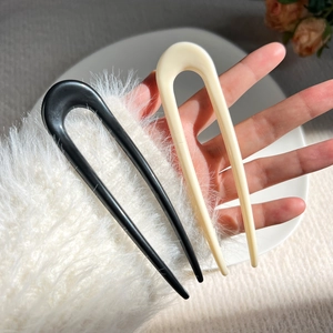 Minimalist U-shaped hair pins in black and beige, set of two shown for size reference
