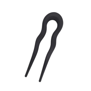 Matte black U-shaped hair fork with wave design for secure bun styling and updos