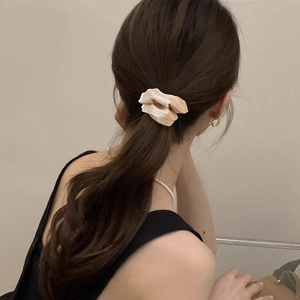 Champagne satin oversized scrunchie on low ponytail hairstyle for women accessories