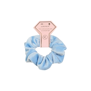 Light blue velvet oversized scrunchie on pink display card for hair styling