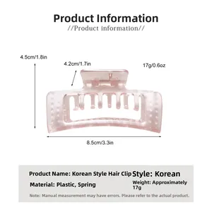 Dimensions détaillées montrant la pince à cheveux rose de 8,5 cm et son poids