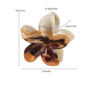 Elegant frangipani hair claw with brown marble texture resin and detailed product size specs