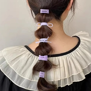 Coffret d'accessoires cheveux violet avec nœuds pour tresses bubble et élastiques souples