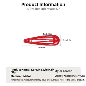 Macro view of a 5cm red candy-colored teardrop metal snap hair clip on white background