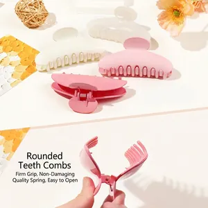Large minimalist hair claw clips in pink and white matte finish for elegant styling