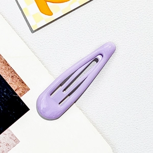 Close-up of lavender purple teardrop metal BB clip with smooth glossy finish coating
