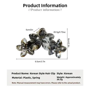 Detailed view of grey marble ink floral hair claw clip with size measurements