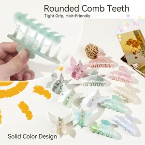 Stereo butterfly hair claws in diverse pastel colors with a sleek marble texture finish