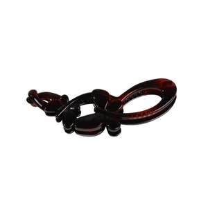 Glossy amber banana hair clip with elegant double butterfly design for ponytail styling