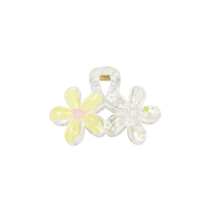 Floral acrylic hair claw clip with yellow and white flowers on a white background