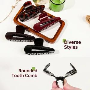 Set di quattro mollette per capelli in resina lucida nei colori tartaruga, bordeaux e nero
