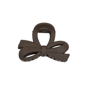 Minimalist matte brown bow-shaped hair claw clip for elegant bun and ponytail styling