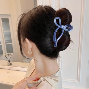 Elegant blue marble bow hair claw clip made of acetate for women's stylish hair styling