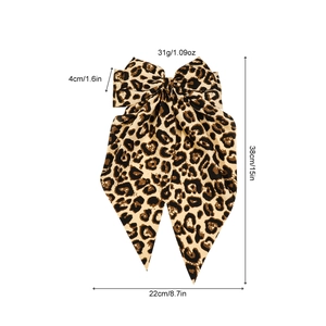 Leopard print bow hair clip for women with detailed length and weight measurements