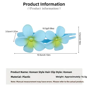 Blue flower hair clip detail showing 10.5cm length with gradient petal design