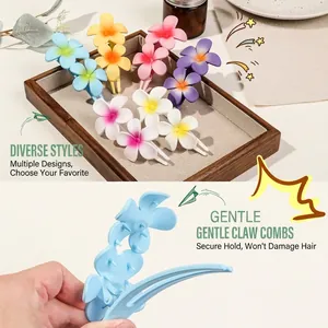 Floral plumeria hair claw clips in various gradient colors with smooth rounded teeth