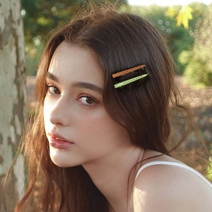 Clip volumizzanti per radici dei capelli arancioni e verdi per styling di frangia