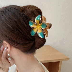Elegant gold metal frangipani flower hair claw clip with green and yellow gradient enamel