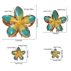 Plumeria flower metal hair claws in four sizes with yellow and green enamel finish
