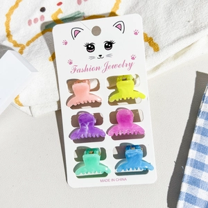Set of 6 colorful mini acrylic hair claws with marble texture on cute display card