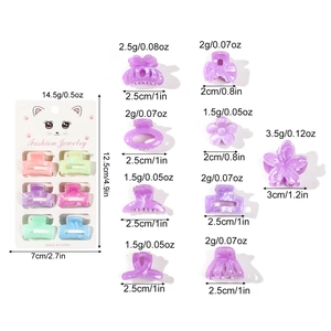 6-pack set of cute pastel hair claws with butterfly and flower resin shapes on card