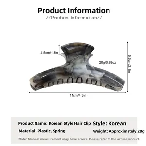 Detail view of large 11cm marble pattern hair claw clip with specific dimensions and weight