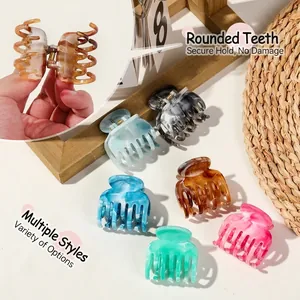 Set of marble texture acetate hair claws with seven teeth for secure half-up styling