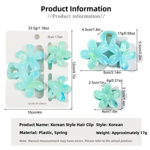Tableau détaillé des tailles pour pinces à cheveux fleurs bleues avec mesures et poids