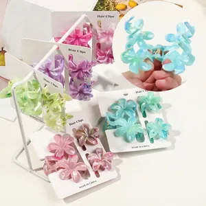 Pinces à cheveux élégantes en résine florale avec texture marbrée et coloris pastel doux
