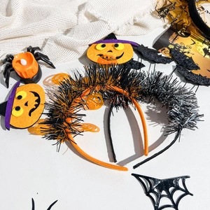 Detailed set of Halloween party headbands including pumpkin decor and LED spider candles