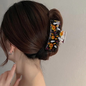 Halloween square hair claw clip with pumpkin and ghost prints on black acrylic finish