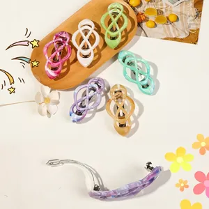 Cross-shaped marble texture spring hair clips with hollow design in multiple colors