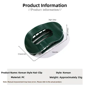 Pince à cheveux ovale vert foncé plate avec dimensions précises 10cm x 5,5cm x 3,5cm