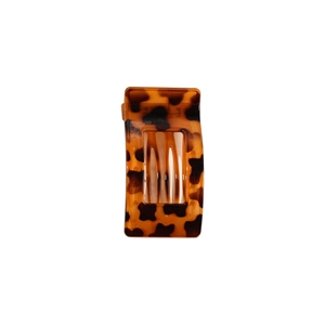 Pince à cheveux élégante en écaille de tortue avec design rectangulaire évidé ambre